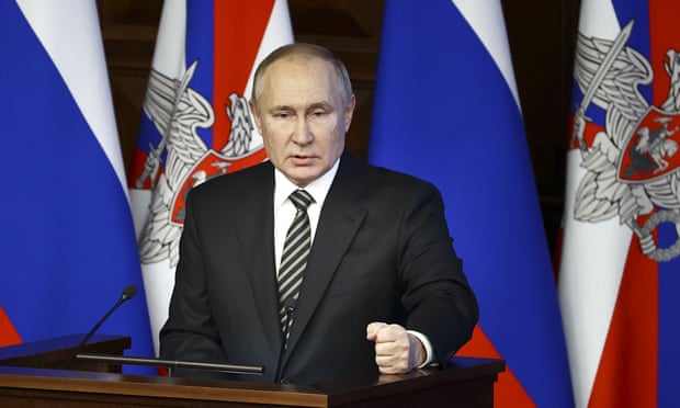 President Vladimir Putin addressing an extended meeting of the Russian defence ministry board.